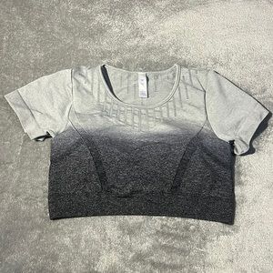This is a workout shirt, size medium color is grey and black.